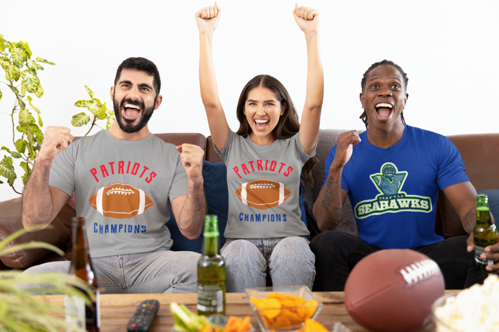 Friends Cheering for their teams in super bowl wearing a custom matching shirts to support them. 