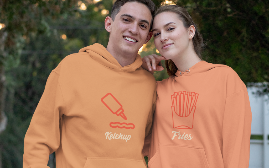 a couple wearing matching hoodies for Halloween